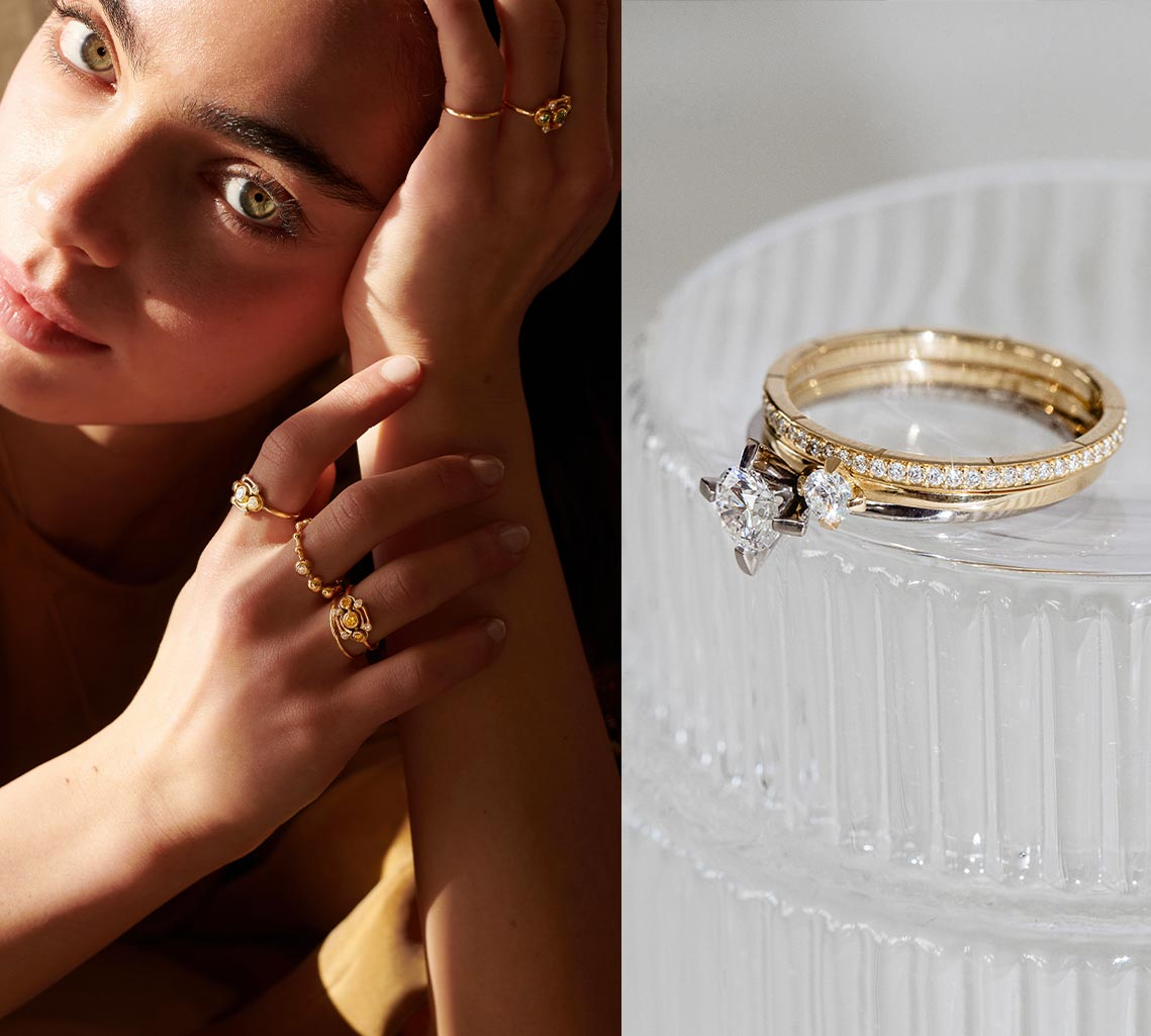 Frau mit Ringen und Ring Stack auf Glas