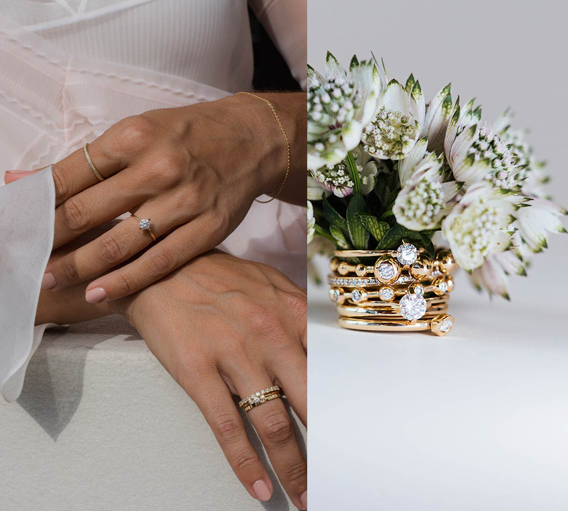 Hände mit Diamantringen und Ringstack mit Blumen und Labordiamanten