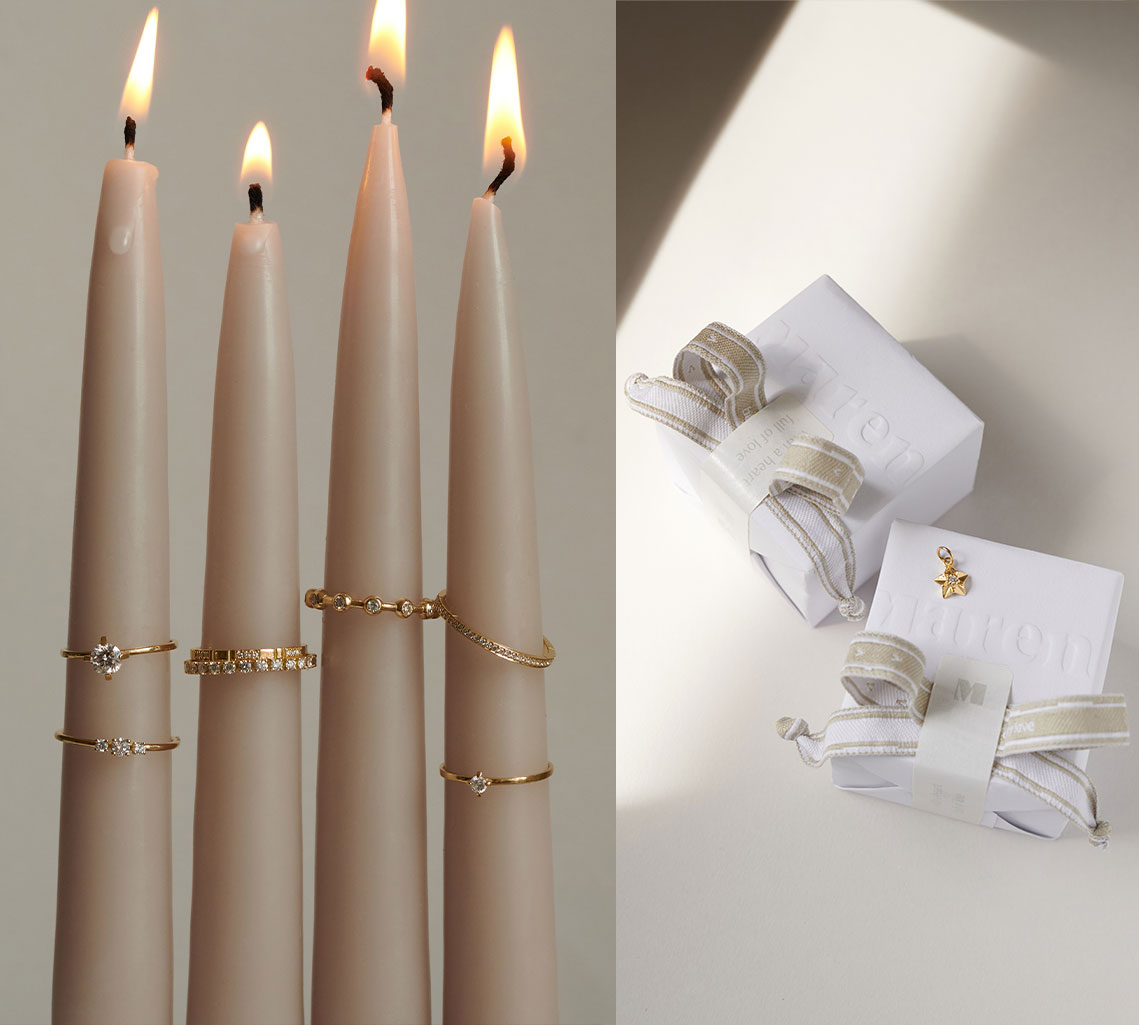 Weihnachtskerzen mit Ringen und Weihnachtgeschenke mit Stern Anhänger