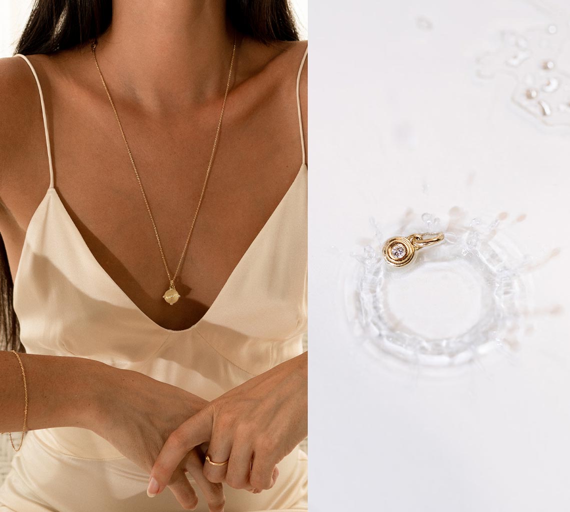 Frau mit Gold Kette inspiriert vom Meer und Wassertropfen Anhänger