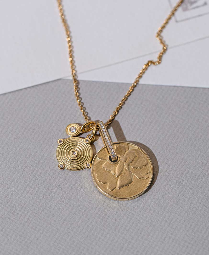 Münz Anhänger aus recyceltem 18 Karat Gold